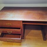 Solid cherry wood desk with 1 block and 3 drawers.