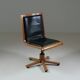 Office armchair in beech and black leather for Cofemo, Italy