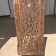 Rectangular Indonesian construction element with blue and yellow plant in carved wood