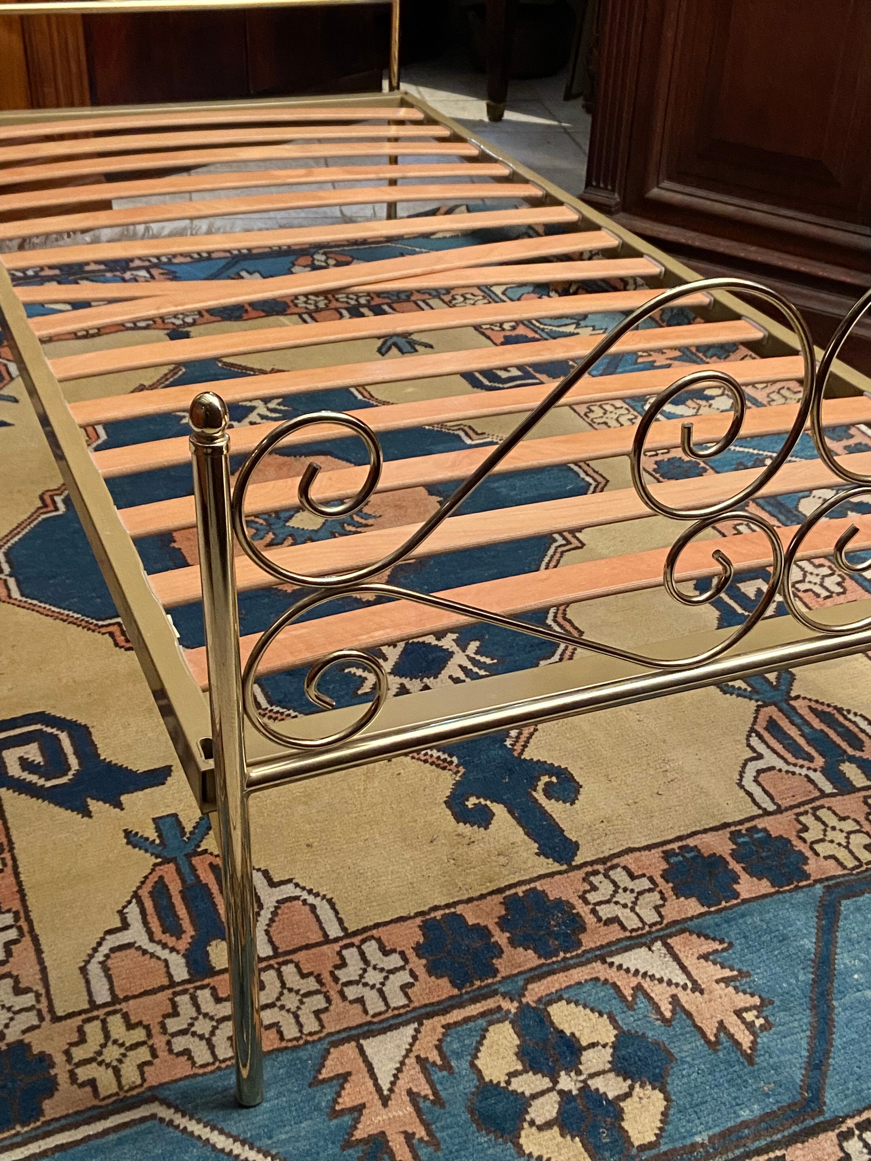 Romantic style single bed in brass with bedside table