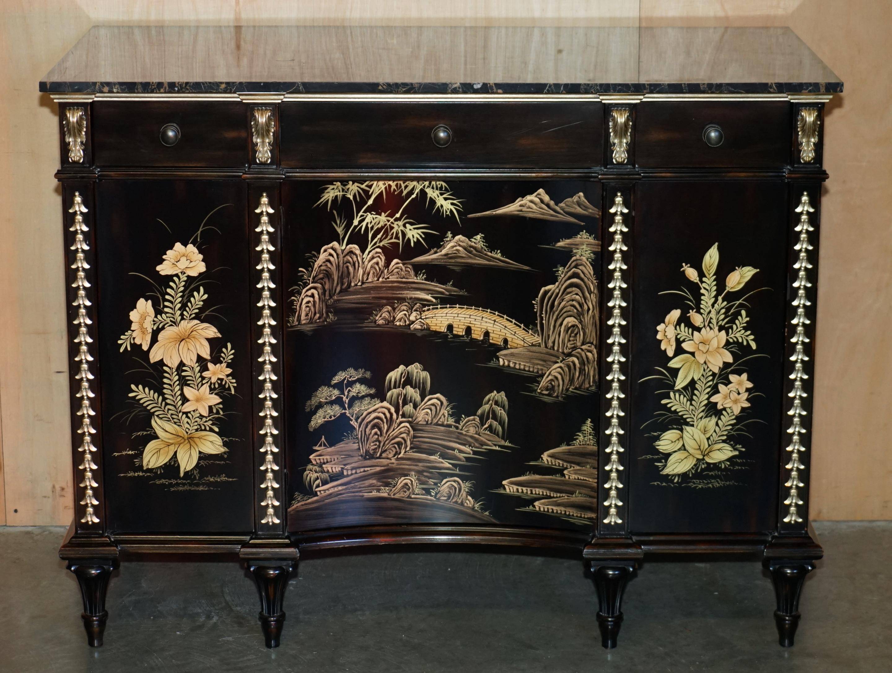 Contemporary Chinese buffet with a marble top and space for a mini-fridge.