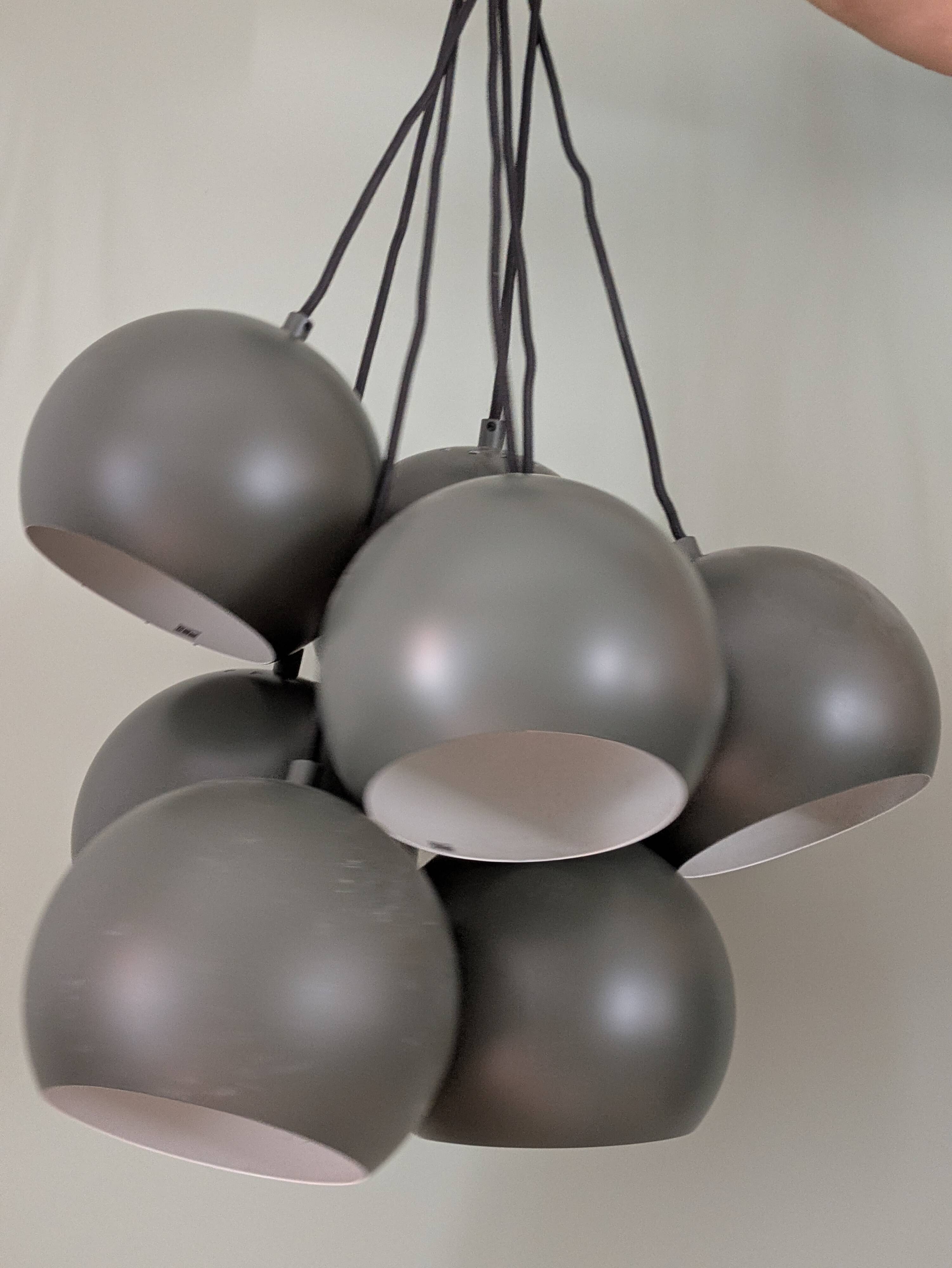 Khaki lamp with 7 bulbs.