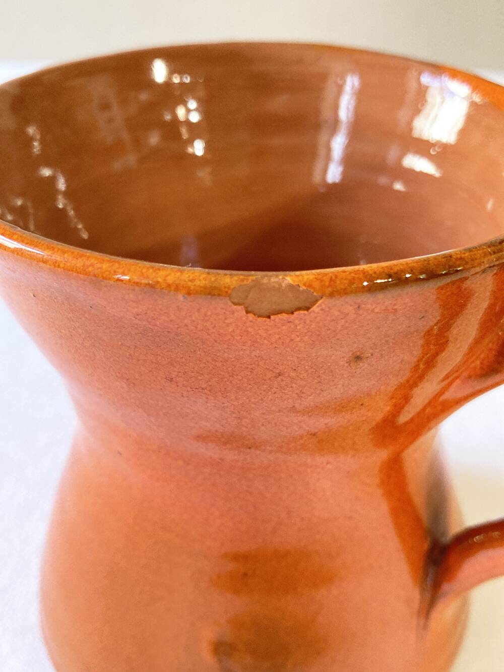 4 large orange enameled ceramic cups, signed