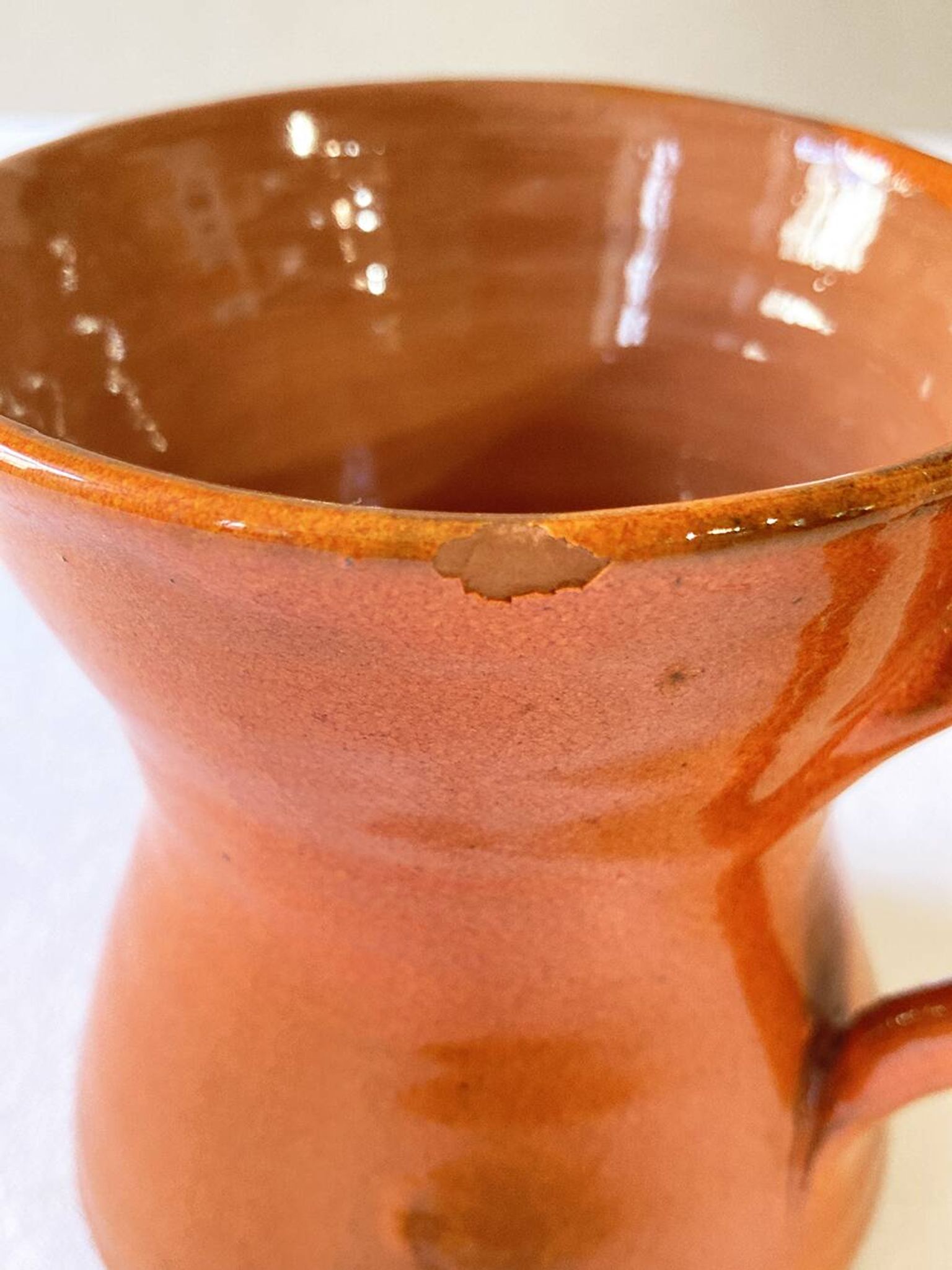4 large orange enameled ceramic cups, signed