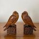 Pair of Art Deco bookend birds in carved wood cubizing 1930