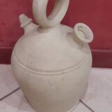 Old terracotta gargoulette jug