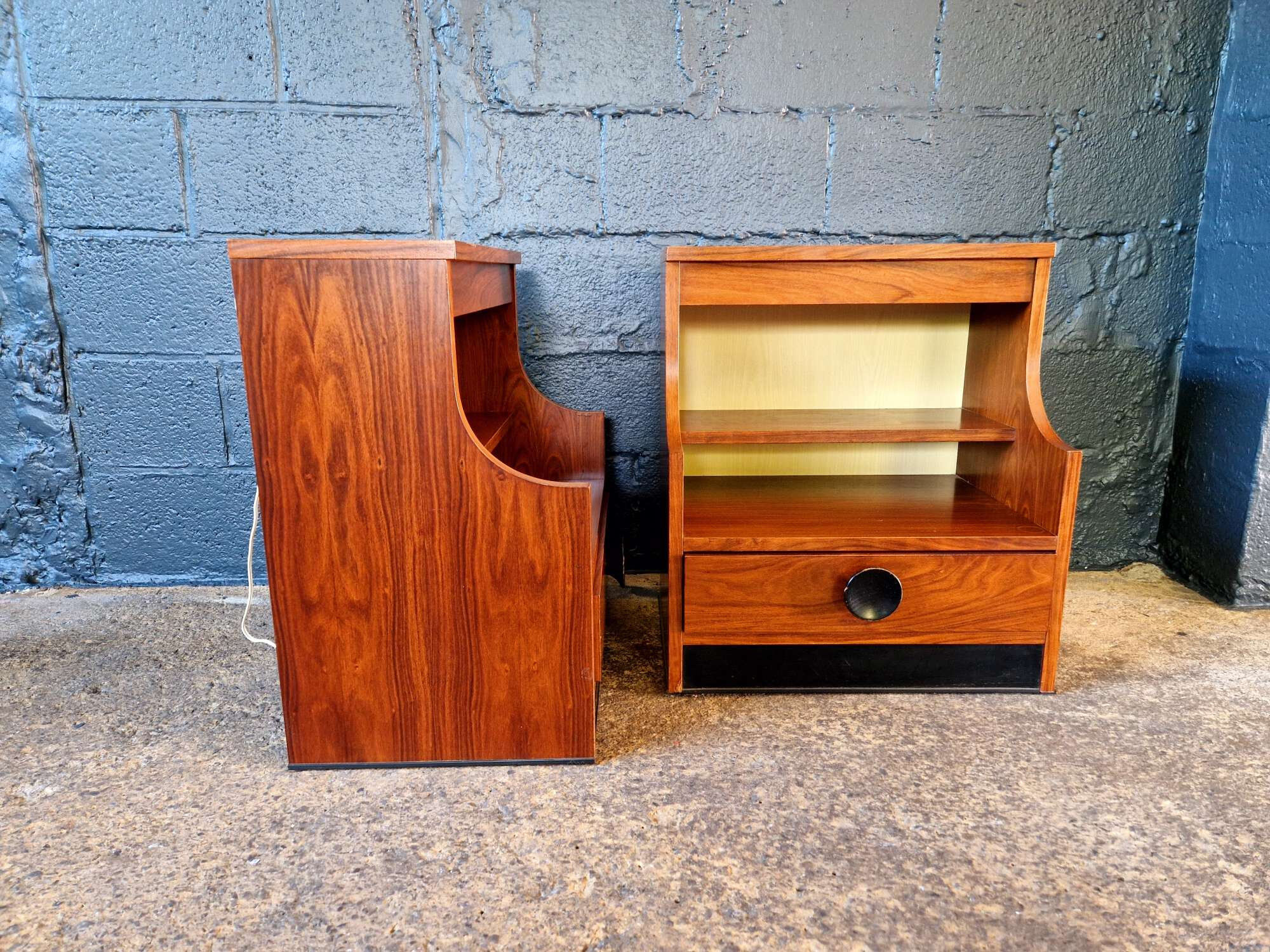 Pair of rosewood bedside tables, 1960s-70s
