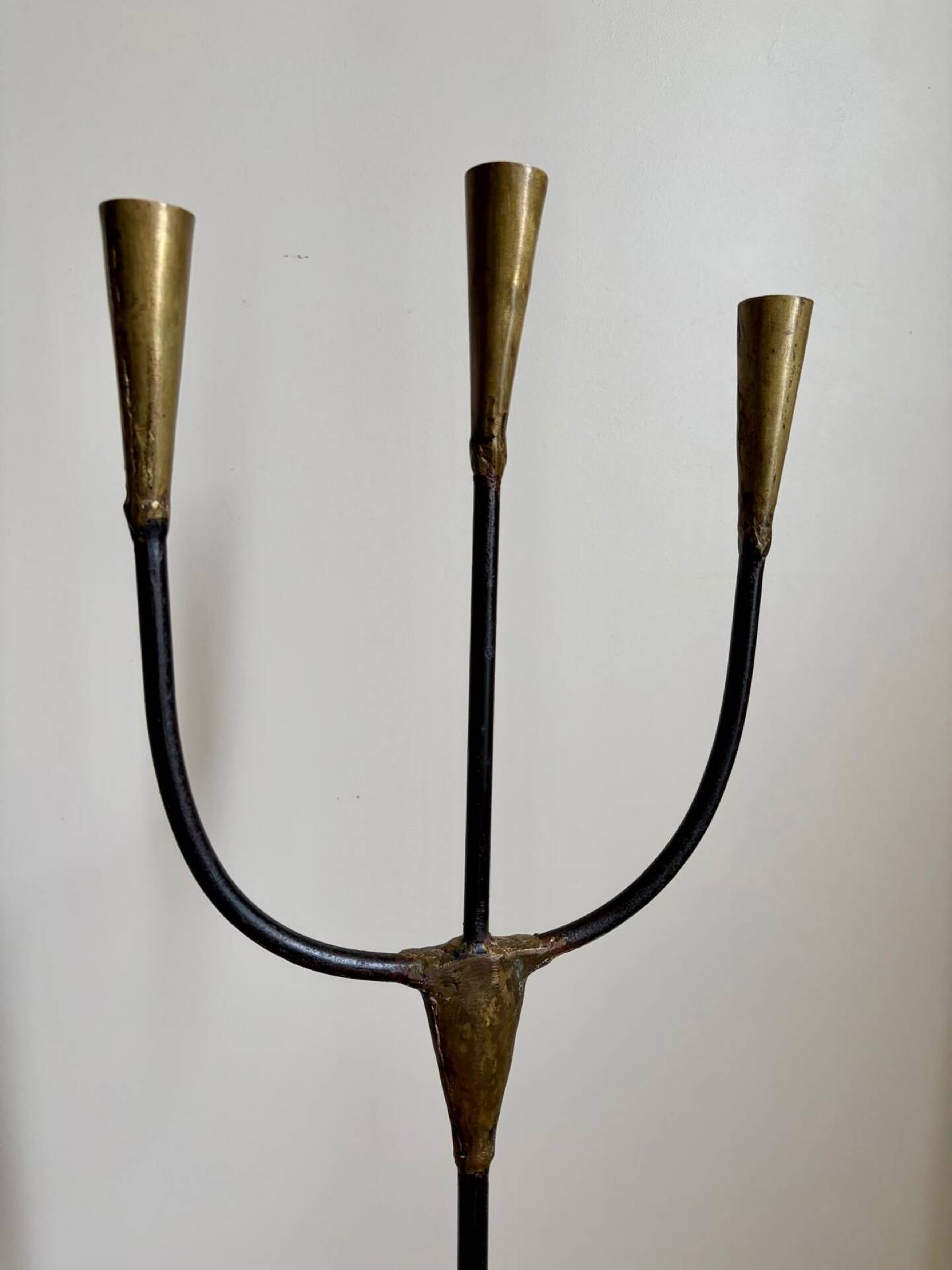Candelabrum for the floor in wrought iron and brass.