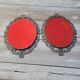 2 antique oval mirrors in heavy metal