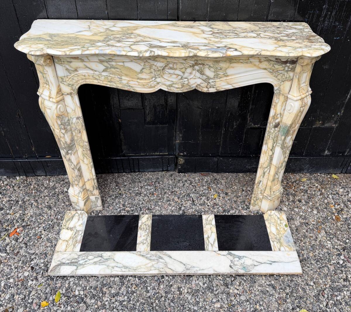 Louis XV style fireplace in purple breccia marble, circa 1880