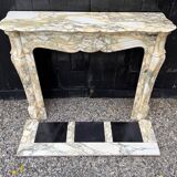 Louis XV style fireplace in purple breccia marble, circa 1880