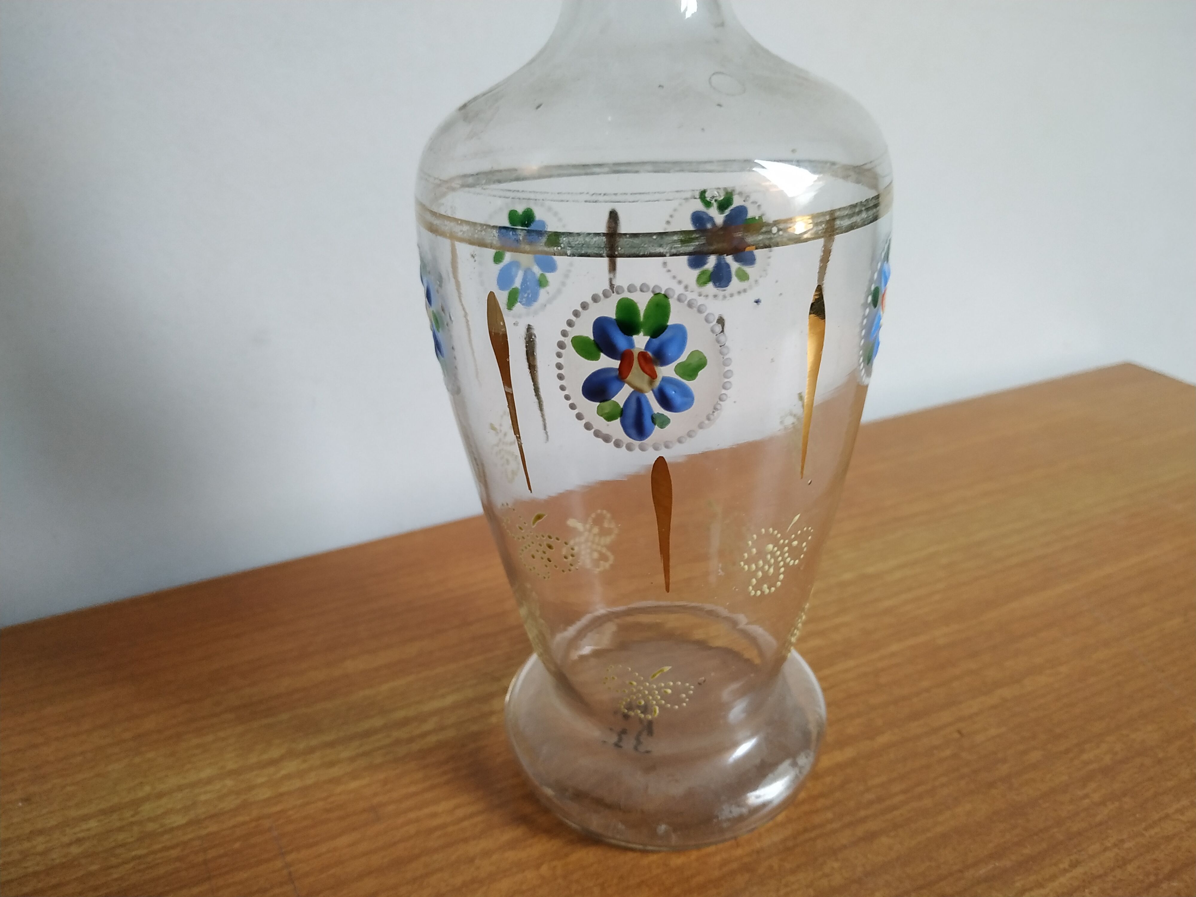 Enamelled glass carafe
