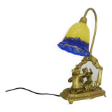 Vintage bronze table lamp featuring a painter on a mirror from the 1960s.