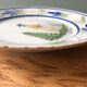 Lot de deux assiettes HB Quimper début XXème