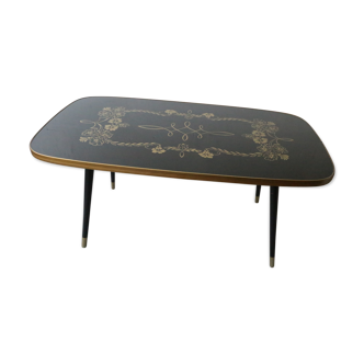 Coffee table with décor, black and gold
