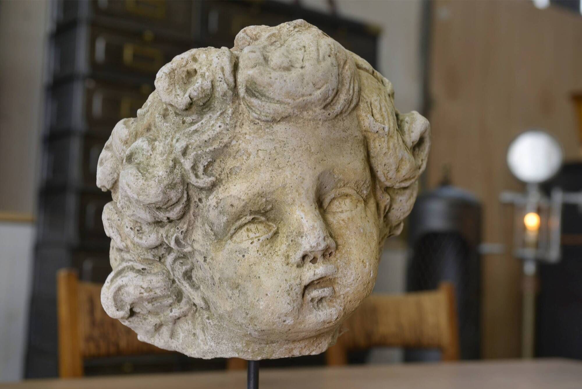 Reconstituted stone sculpture in antique style from the 20th century.