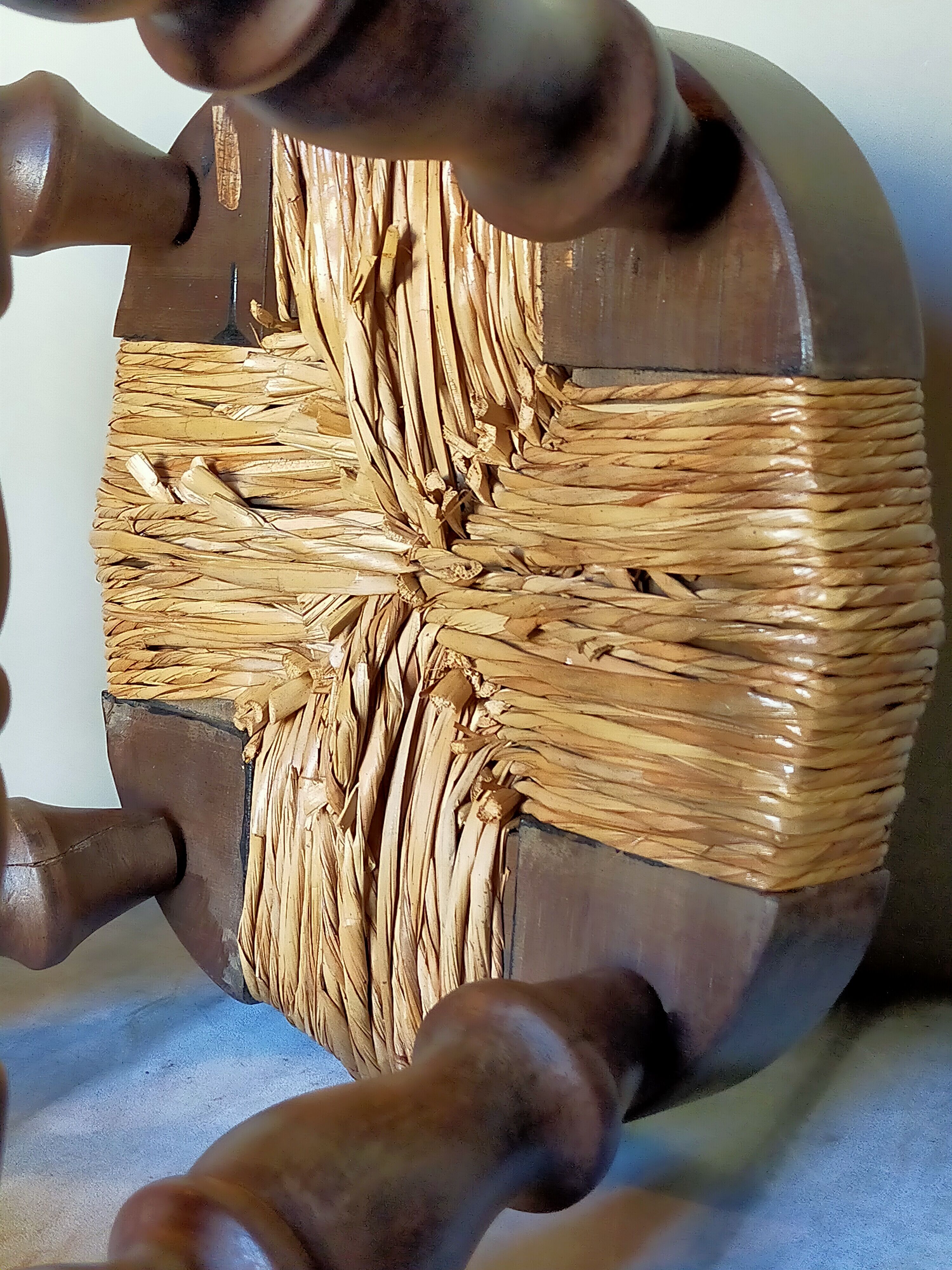 Low vintage regional stool in solid wood with straw top