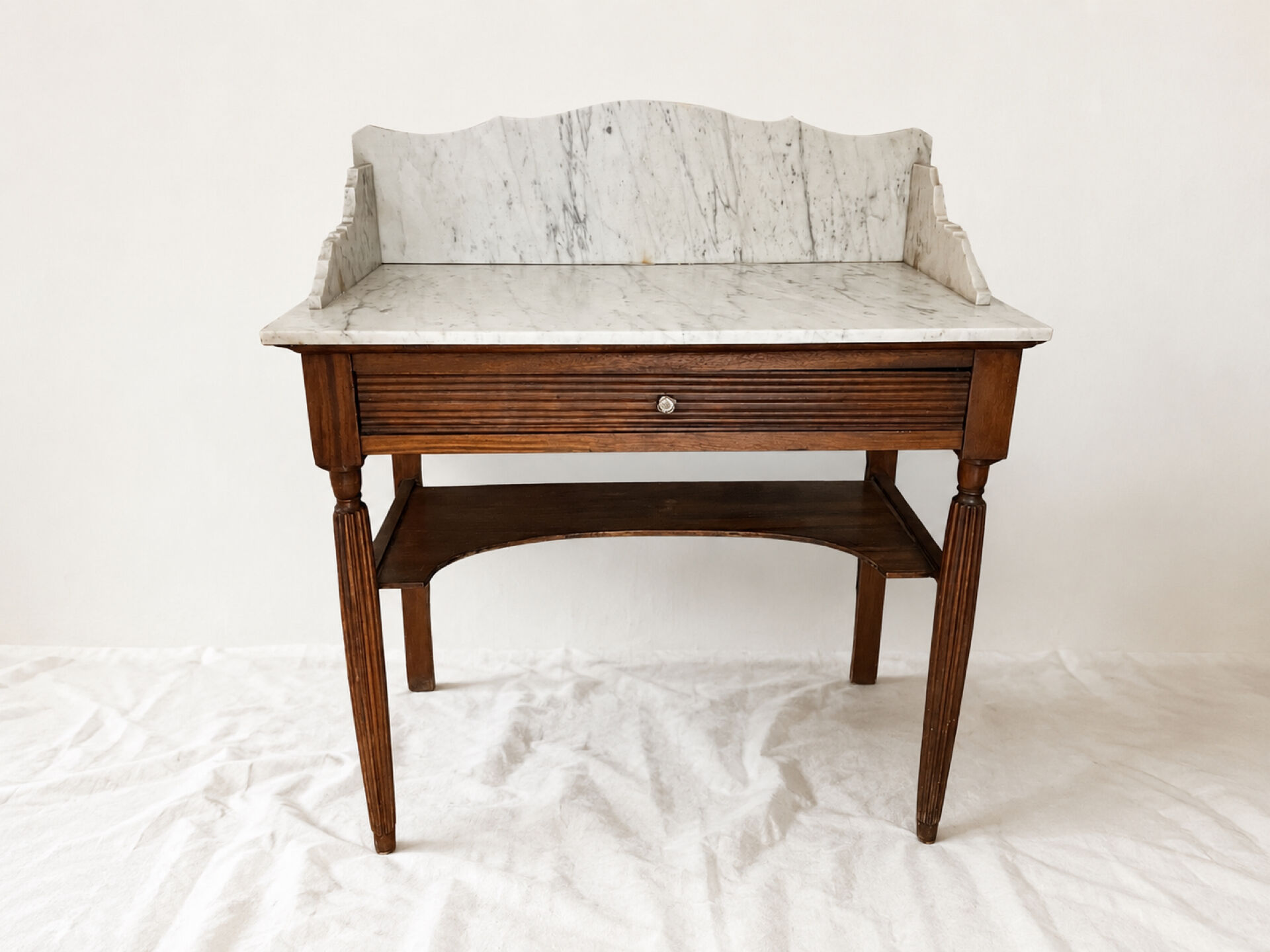 Antique wooden and veined white marble dresser, Louis XVI style.