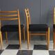 Set of 4 dining chairs in wood and black fabric 1960s