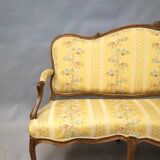 Natural wood canapé, moulded and carved, late 19th to early 20th century.