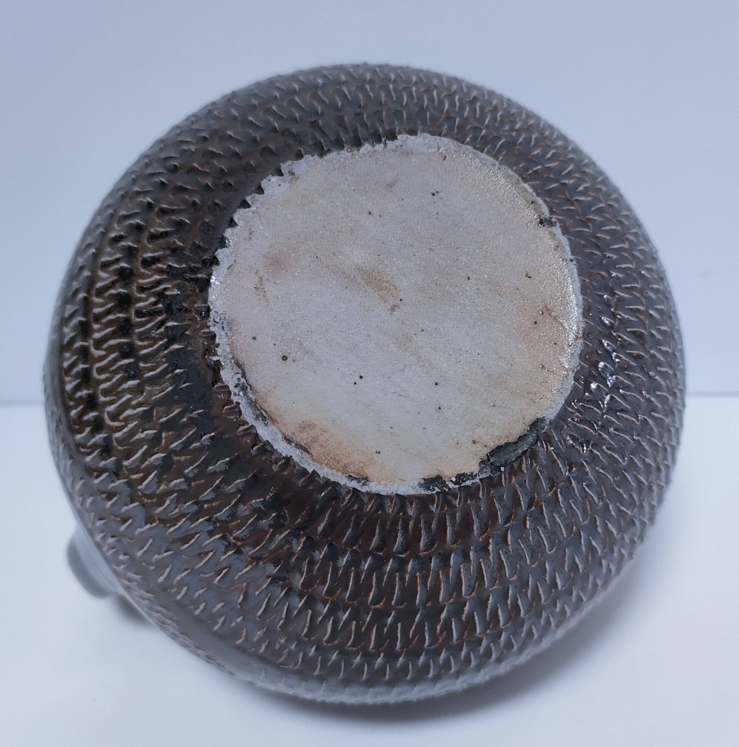 Vintage scarified glazed stoneware pitcher