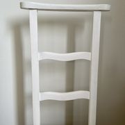 Old white mulched wooden chair
