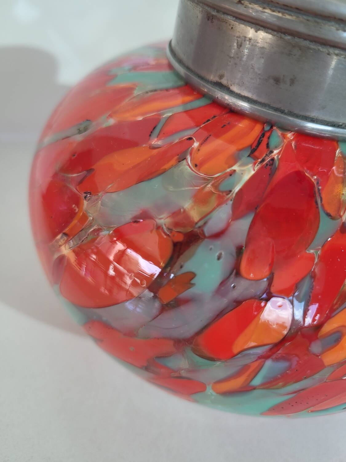 Old multi-colored glass flower vase