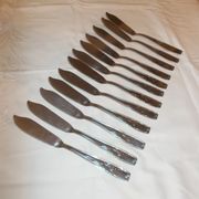 Lot of 12 metal fish cutlery sets.