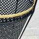 Vintage black perforated metal and brass umbrella stand