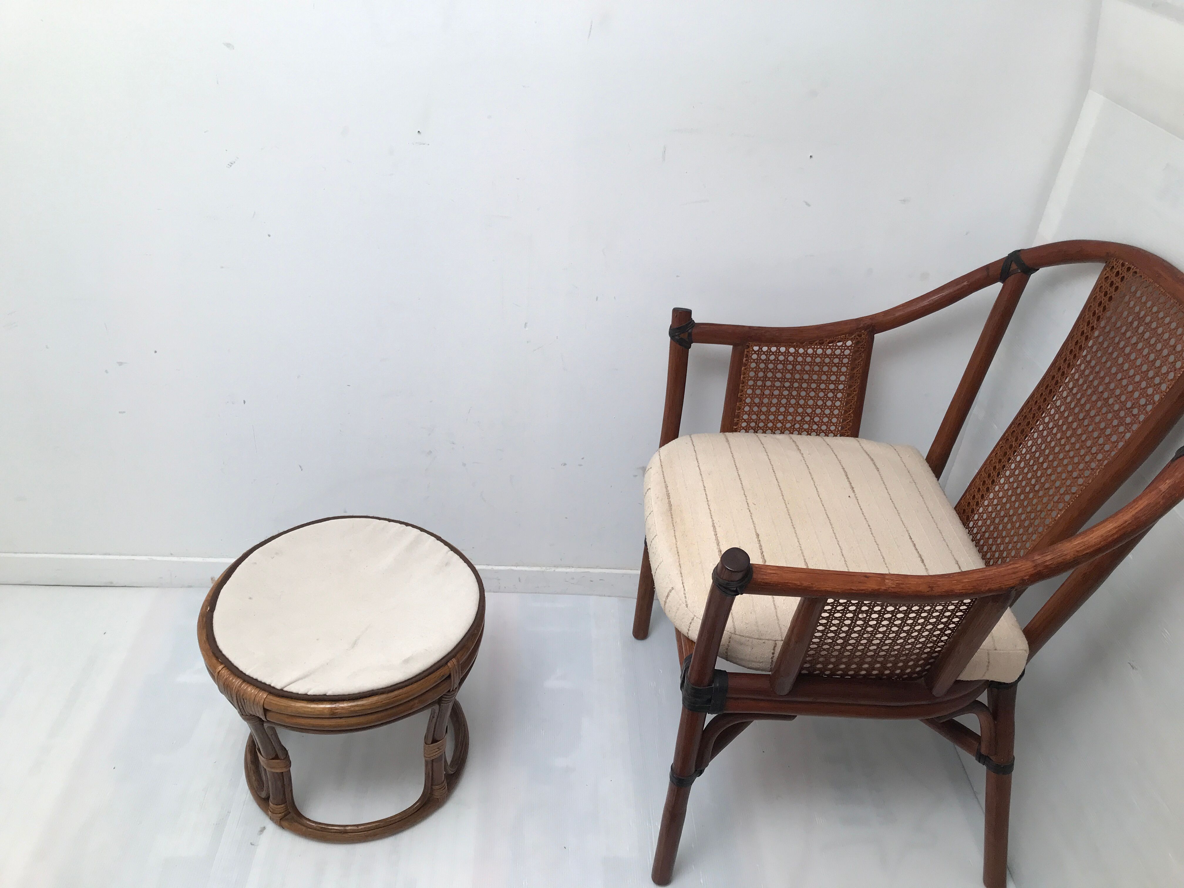 Rattan armchair with its footrest 70s