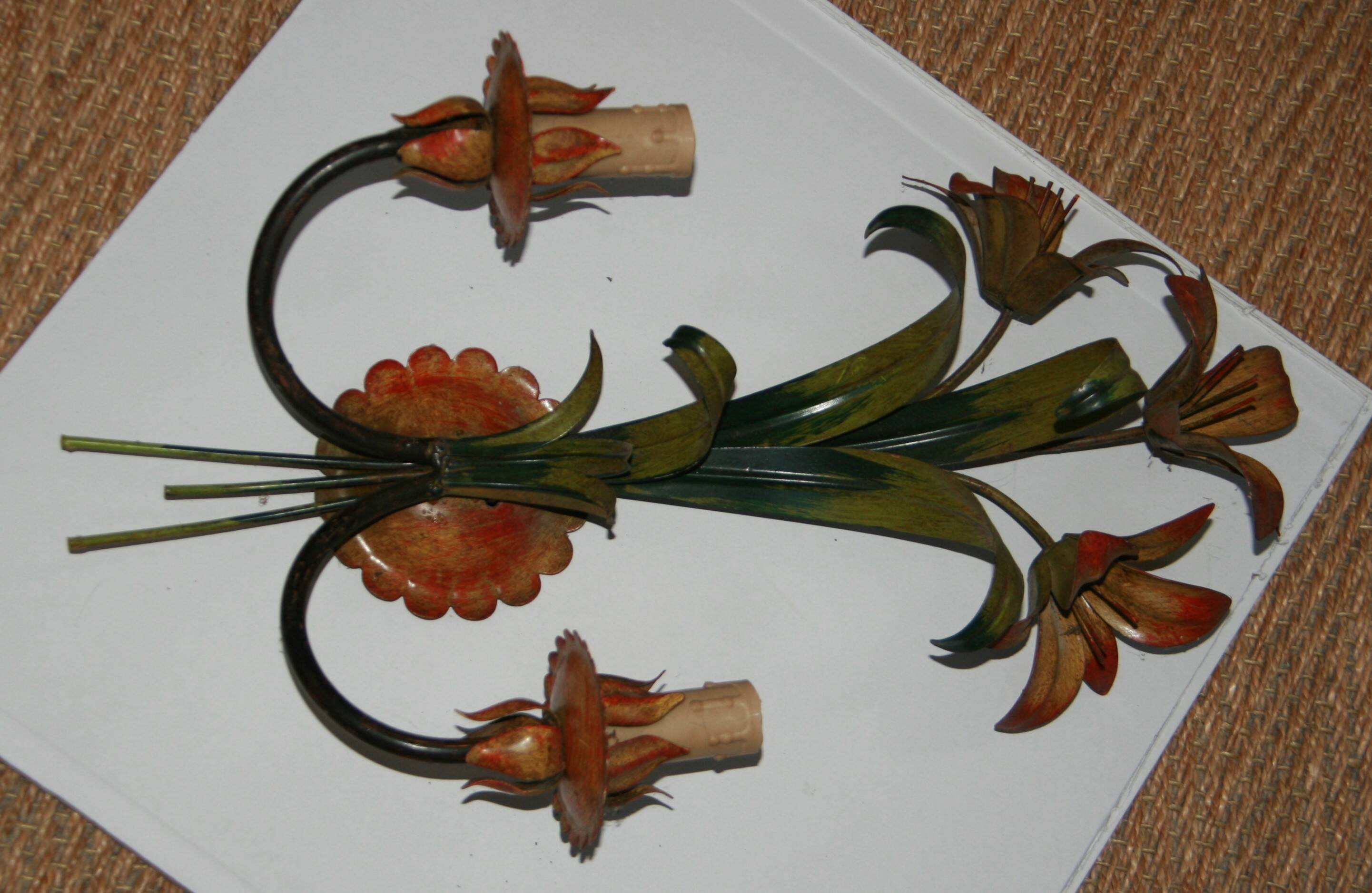 Pair of vintage floral wall sconces in Italian Florentine style metal.