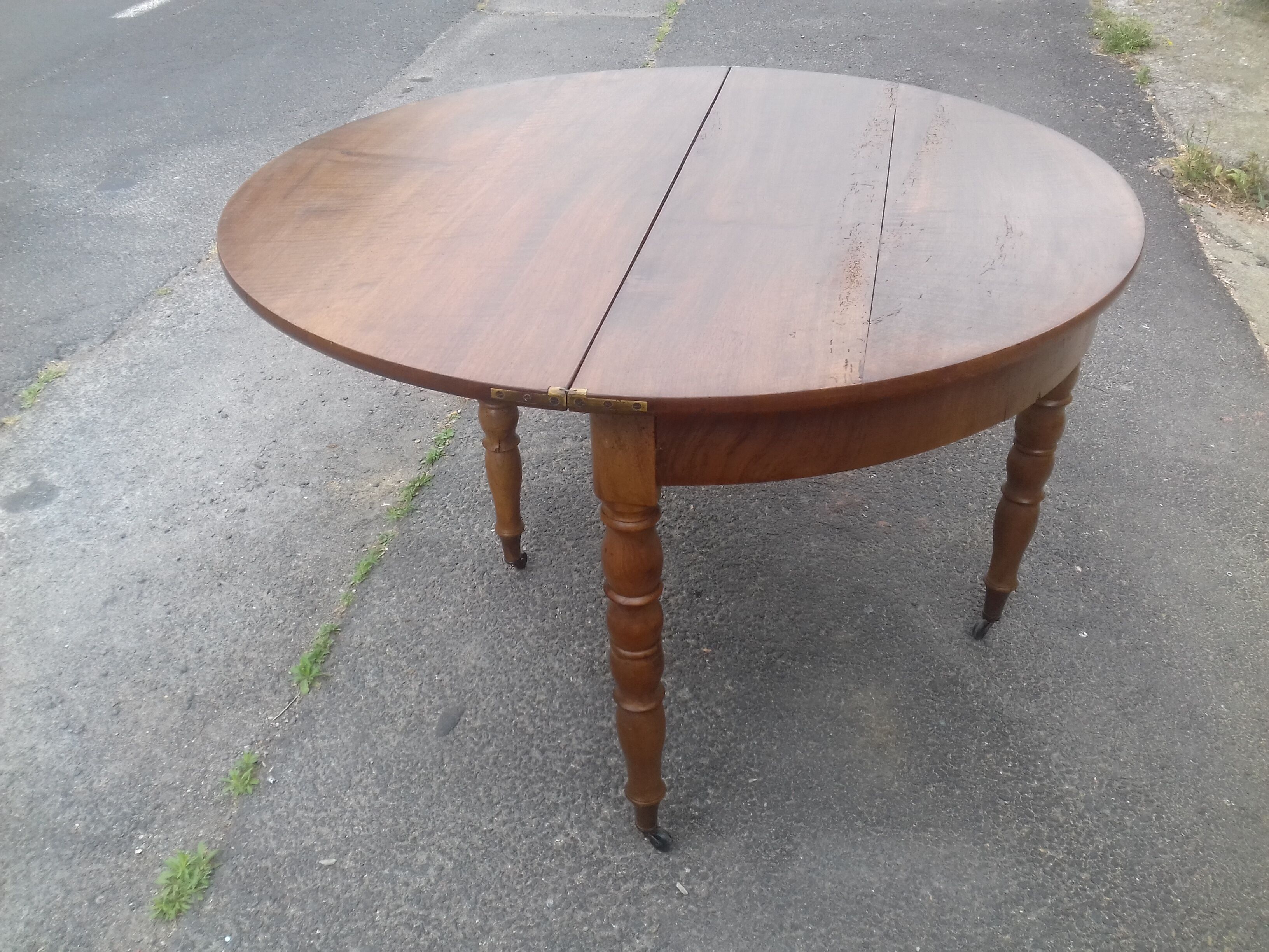 Half-moon walnut console table, circa 1840, Jacob base