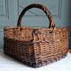 Handmade woven and dyed willow harvest basket.