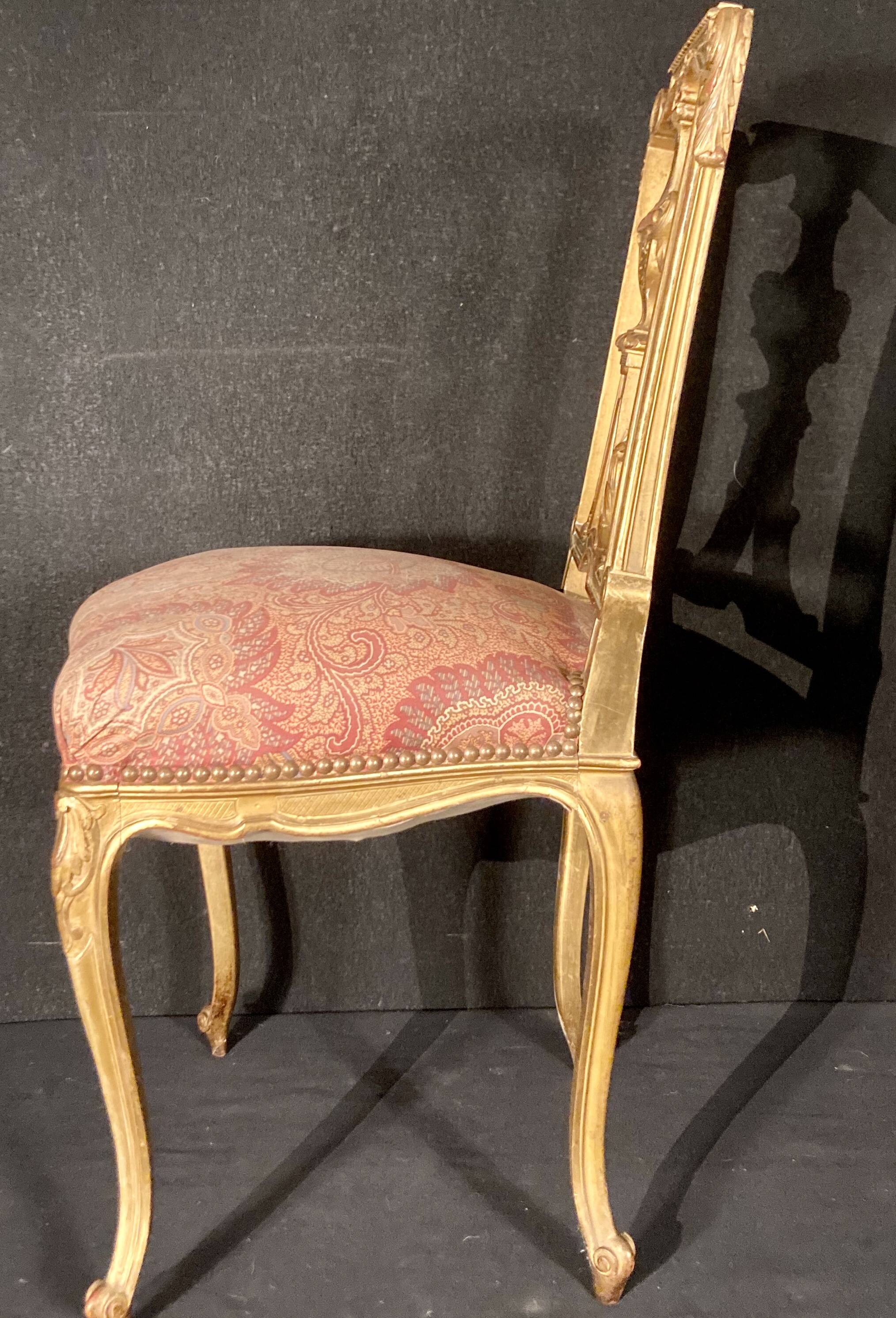 Pair of gilded wooden chairs