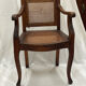 Caned armchair
