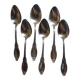 A set of 6 silver-plated metal soup spoons with foliage design.