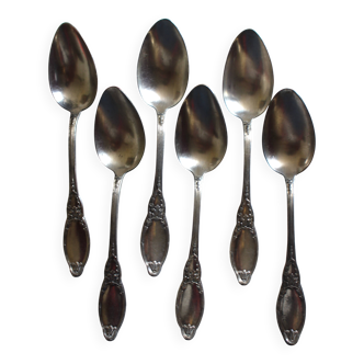 A set of 6 silver-plated metal soup spoons with foliage design.