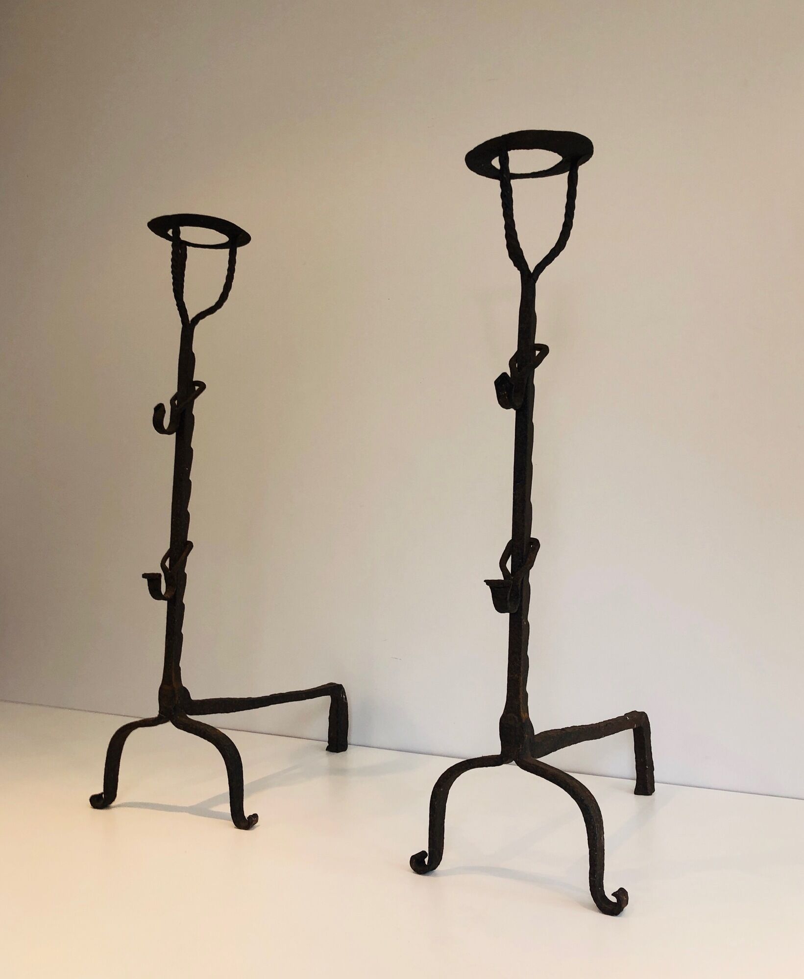 Pair of wrought iron landiers. french work ,seventeenth century