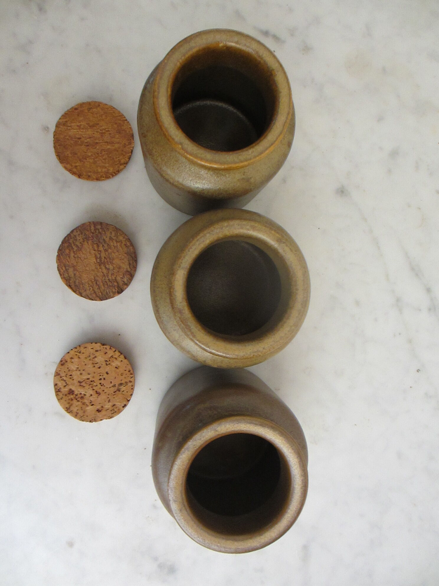 Series of 3 sandstone pots