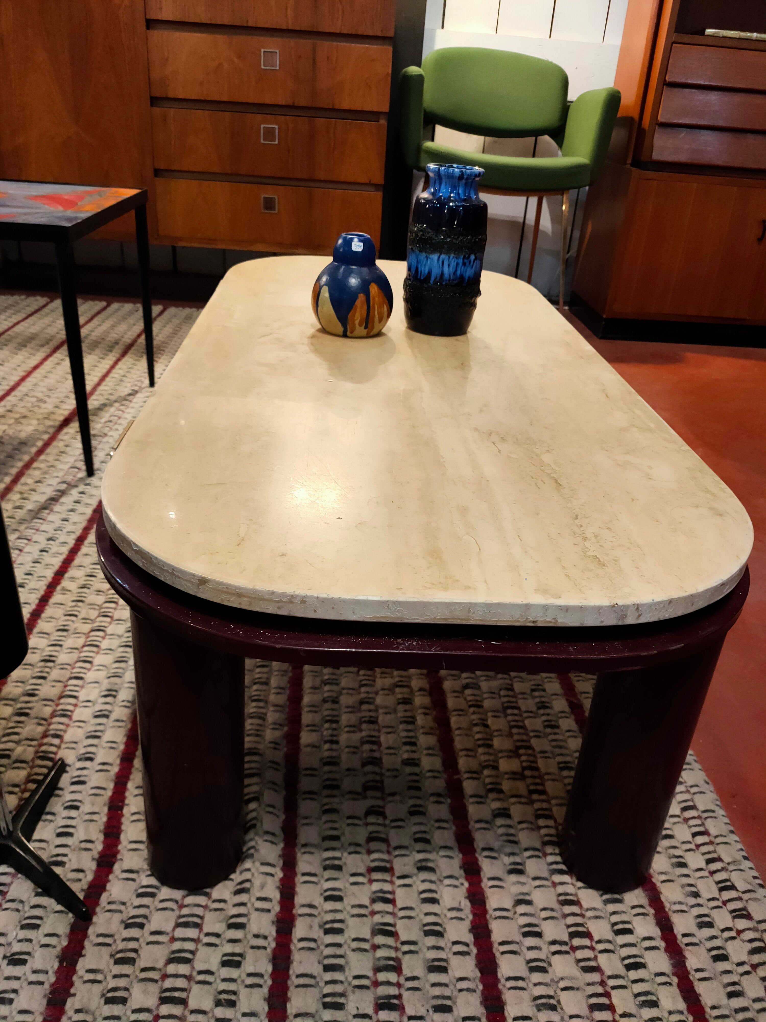 Coffee table Travertine top, garnet-colored metal stand and legs.  Long
