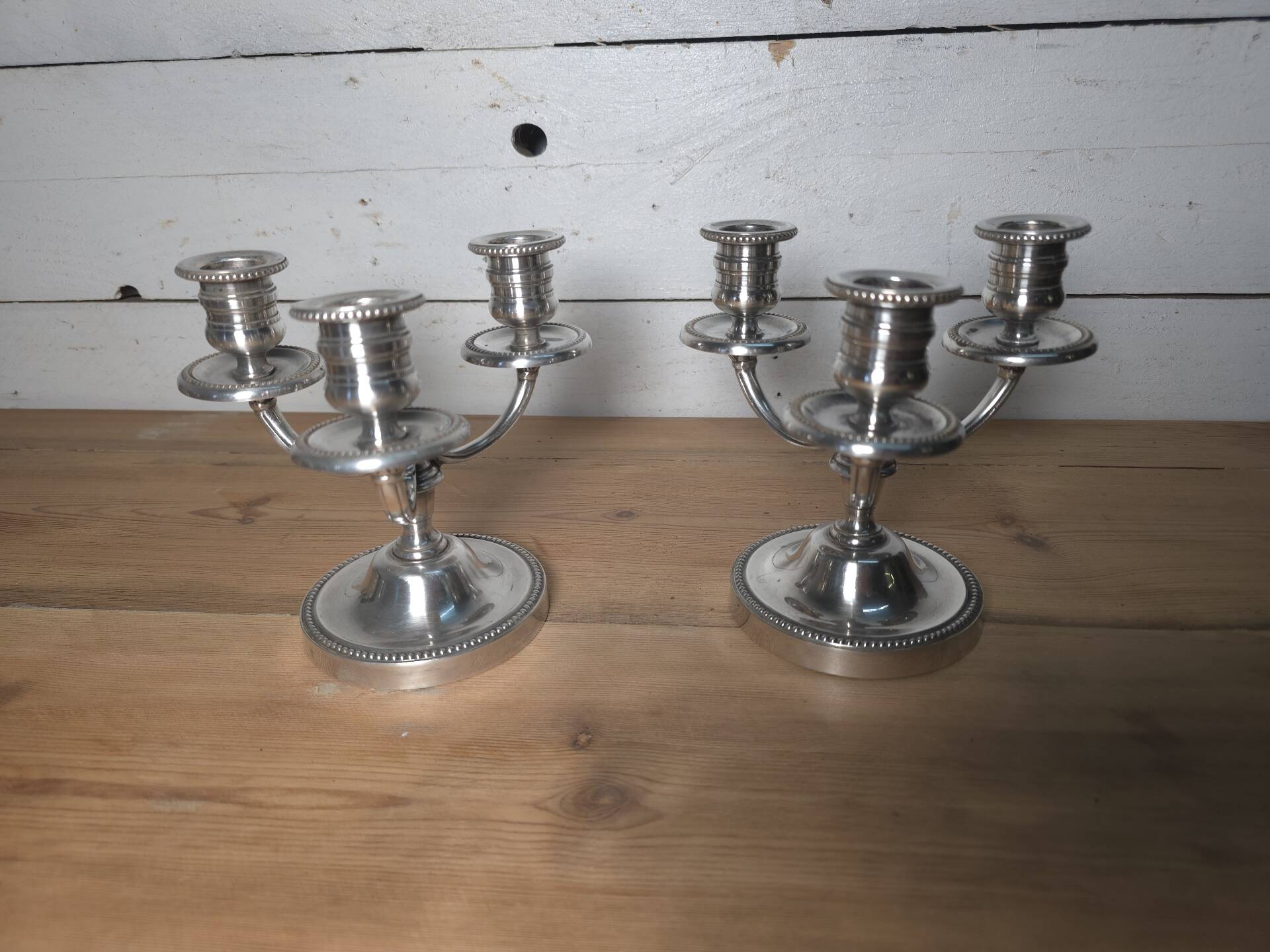 Pair of silver-plated candlesticks