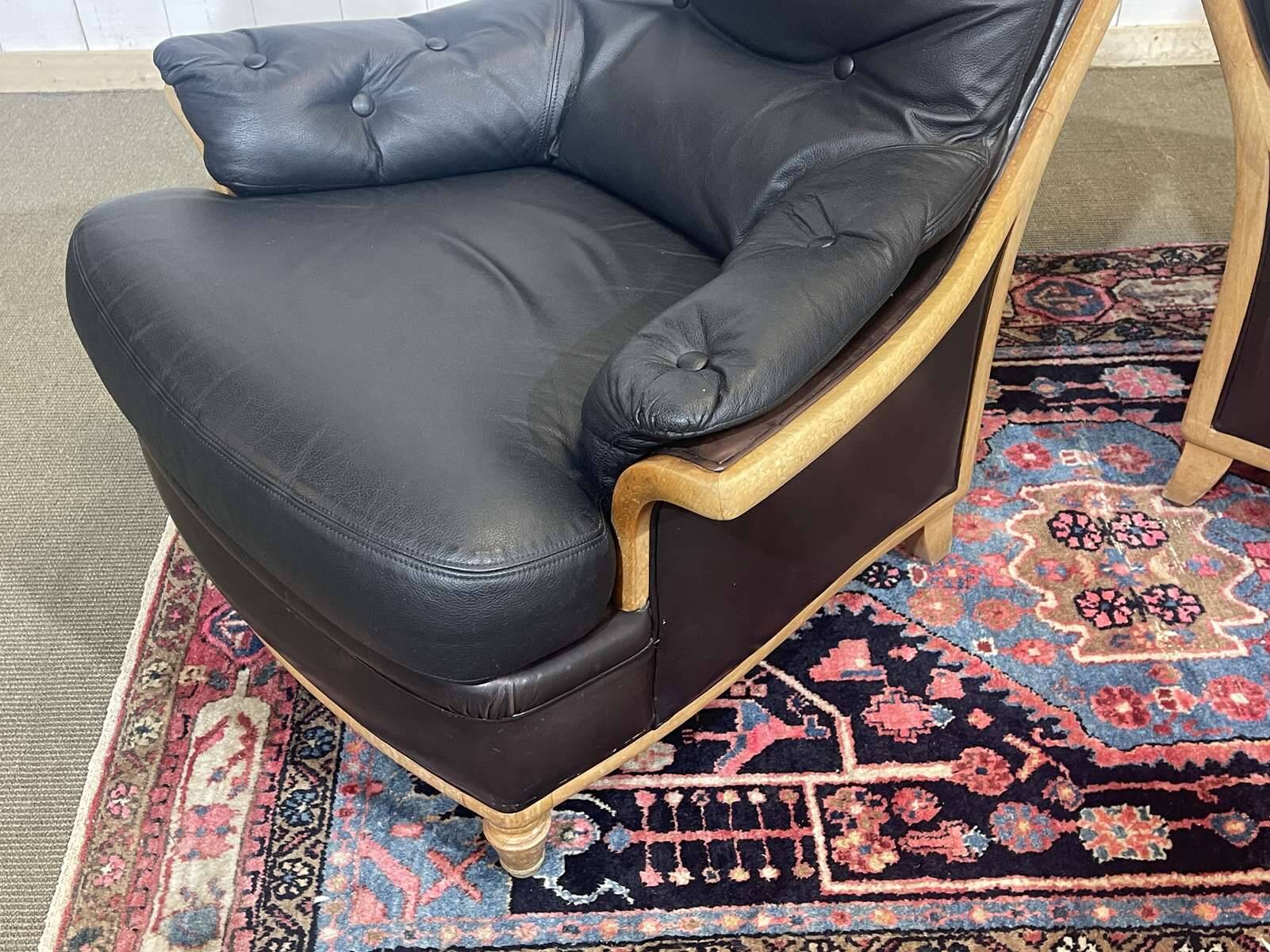 Pair of leather and beech armchairs from the 1970s.