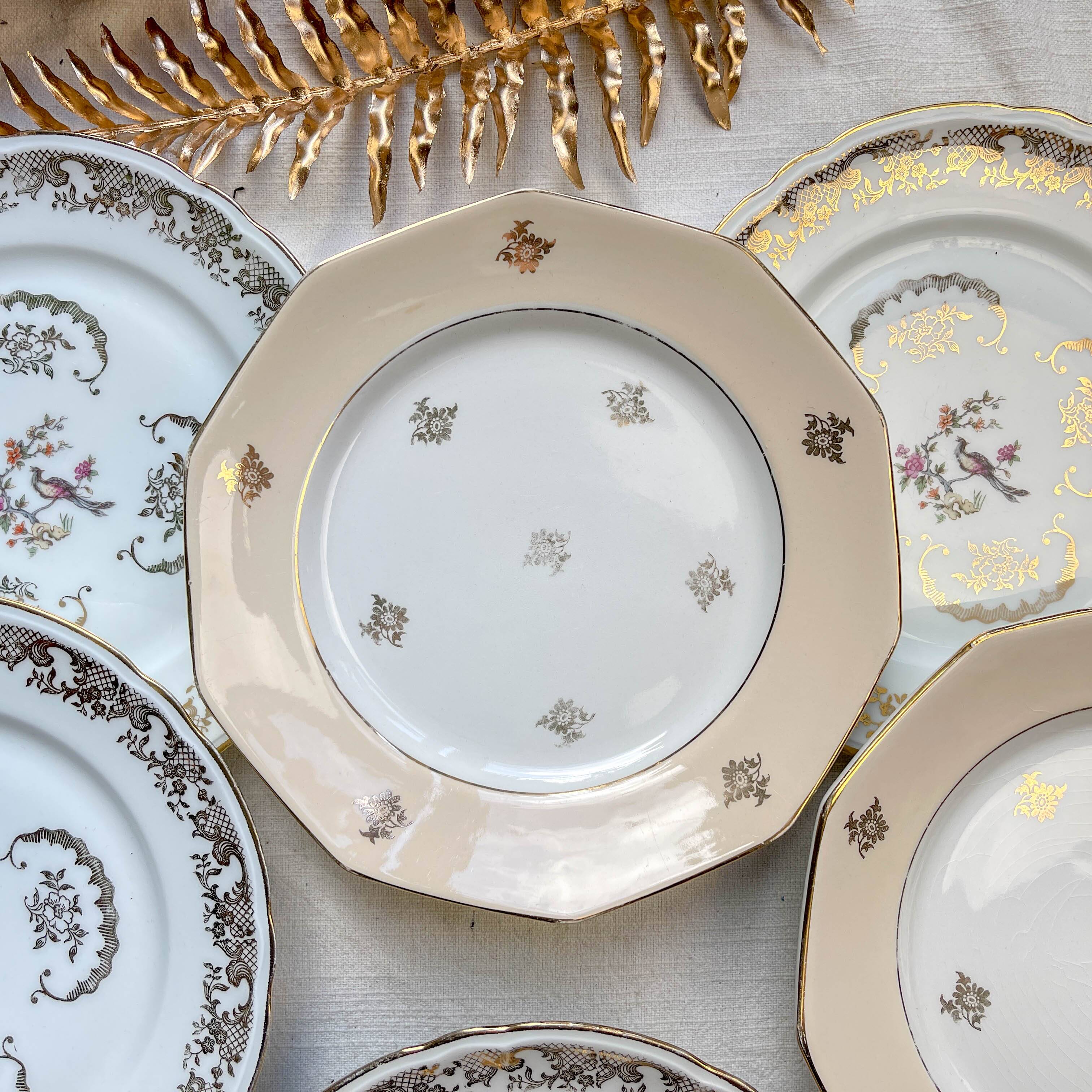 8 small vintage mismatched plates in French Limoges porcelain, Orchies - golden flower and bird motifs
