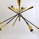 Lustre Sputnik articulé noir et laiton style Stilnovo, Italie, 1950