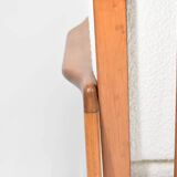 Canapé des années 60, en teck et bouclé blanc.