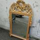 Antique gilded wooden mirror in Louis XVI style