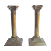 Paire de bougeoirs colonnes en laiton et bronze