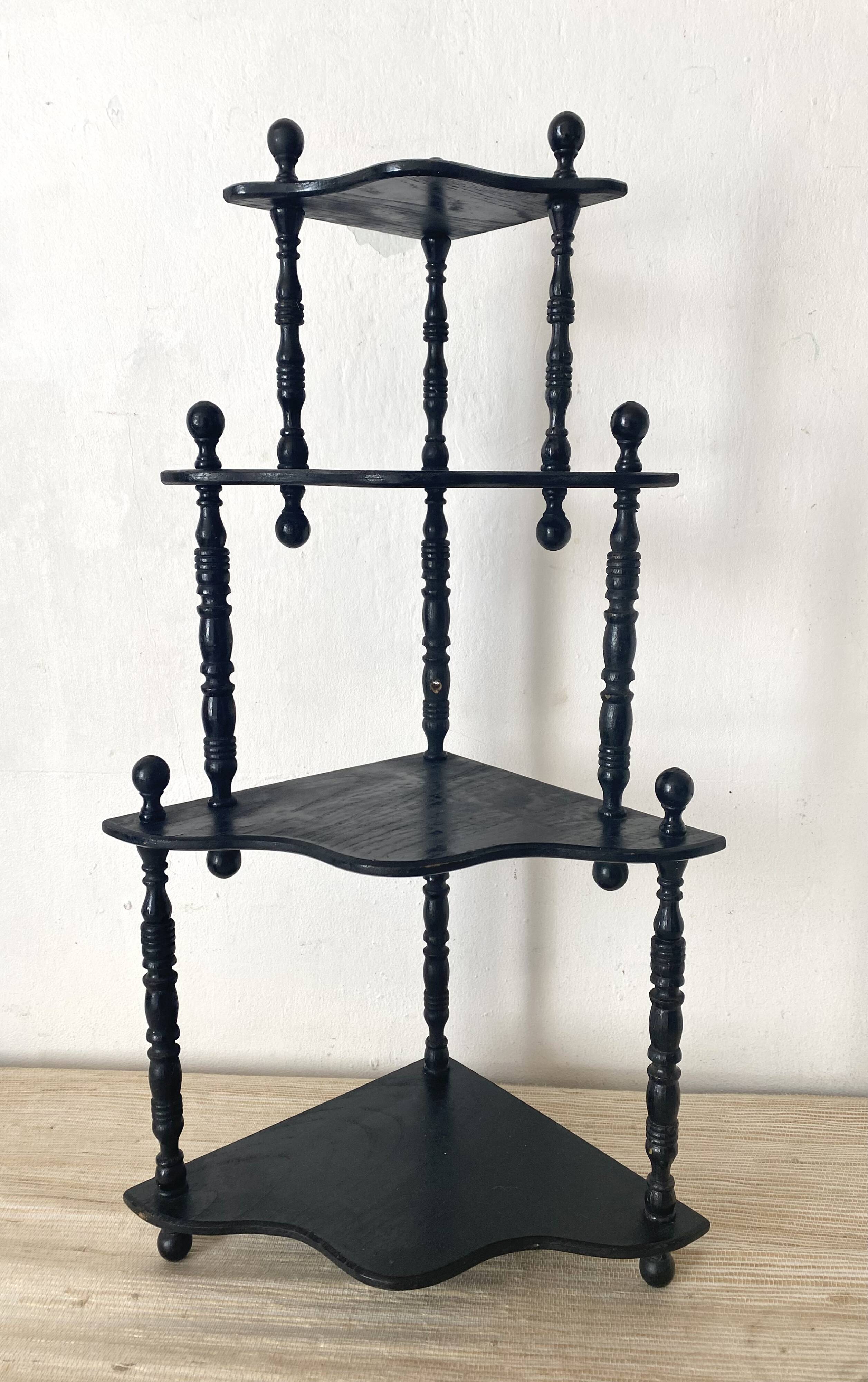 Corner shelf to place or hang in black lacquered wood