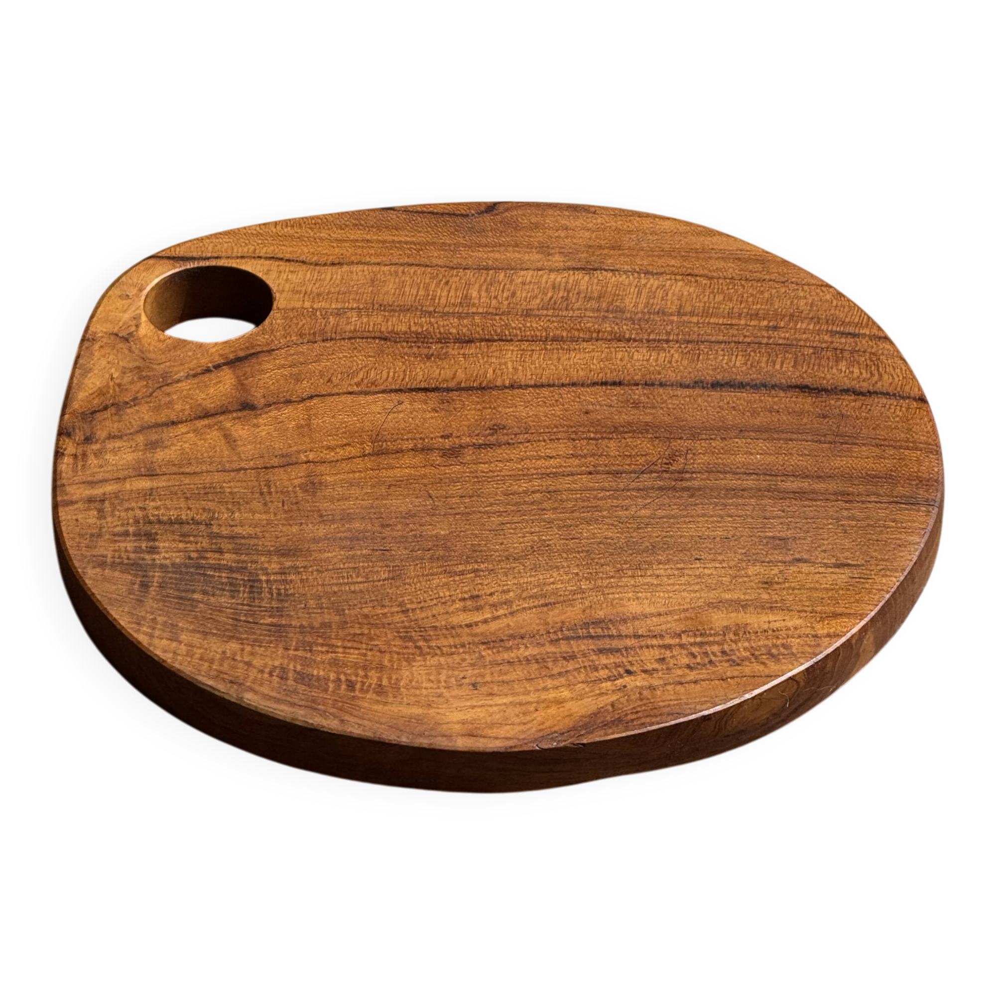 Average circular teak monoxyle chopping board with handle 26 x 18.