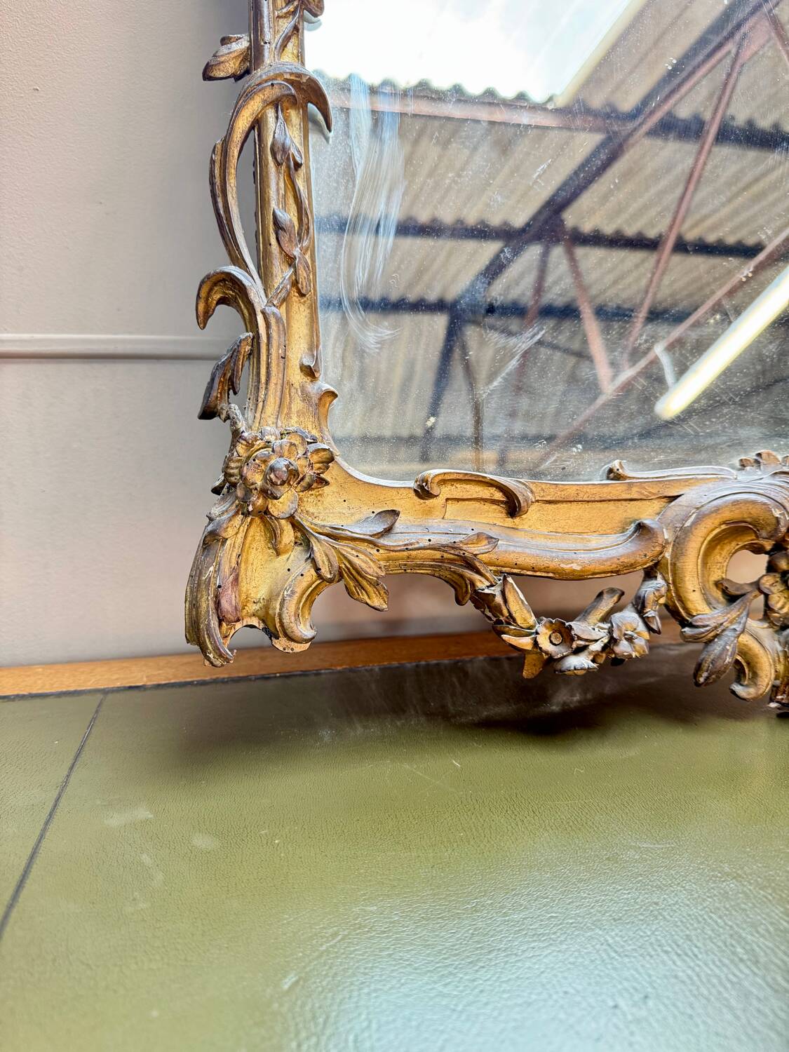 Louis XV period wooden and gilded stucco mirror, 18th century